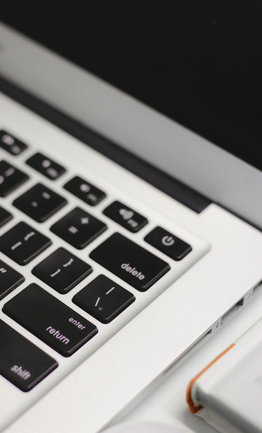 black and silver laptop computer